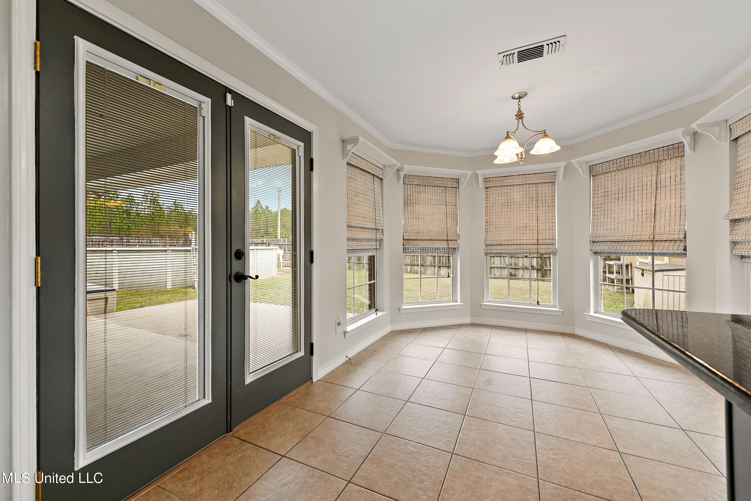 15300 Parker Road Biloxi, MS 39532 - Photo 9 of 24 Dinning and Exit to Patio