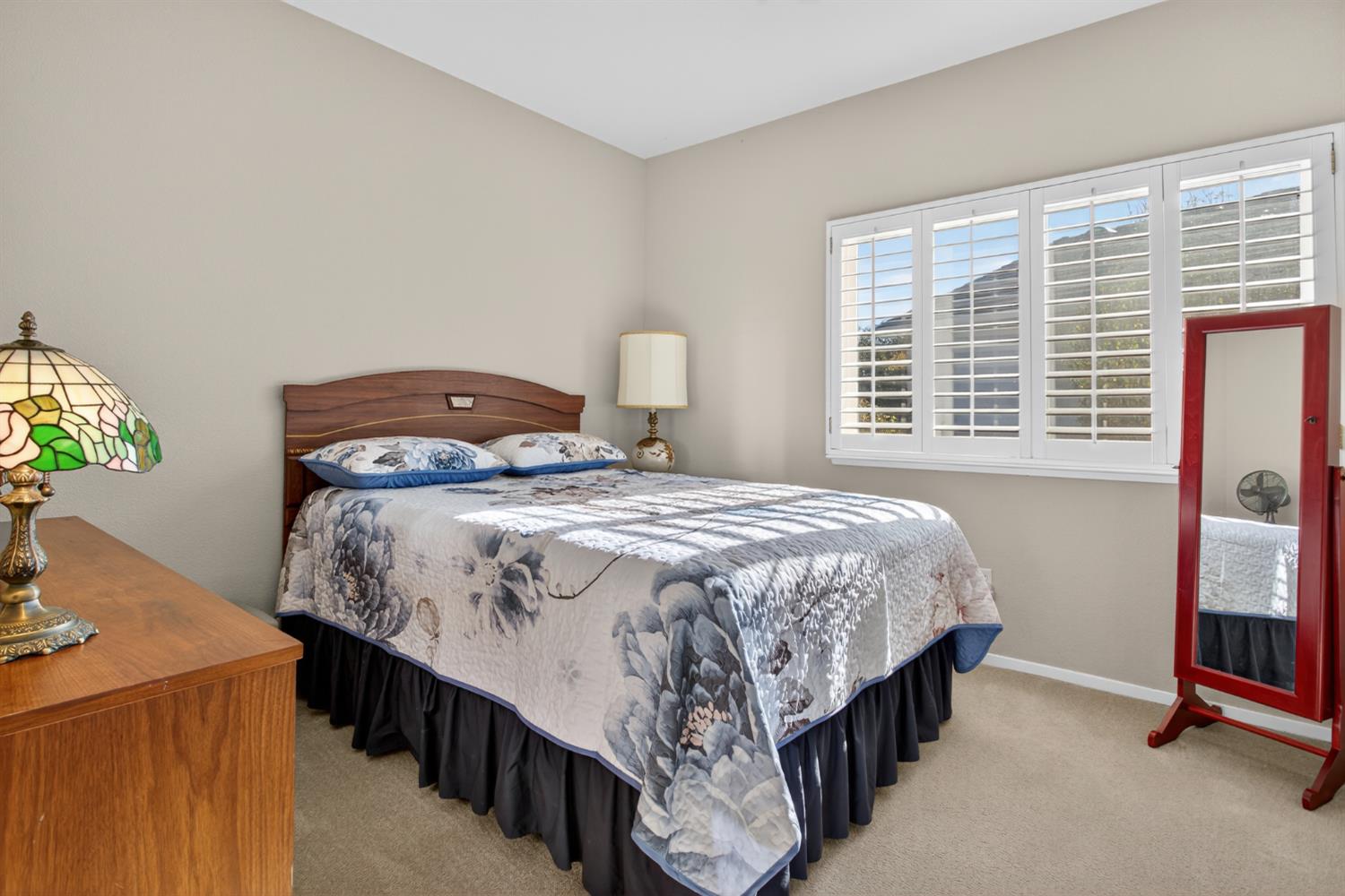 3200 Spring Garden Drive Turlock, CA 95382 - Photo 21 of 30 a bedroom with a bed and a window