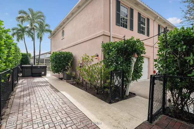 an aerial view of a house with a garden