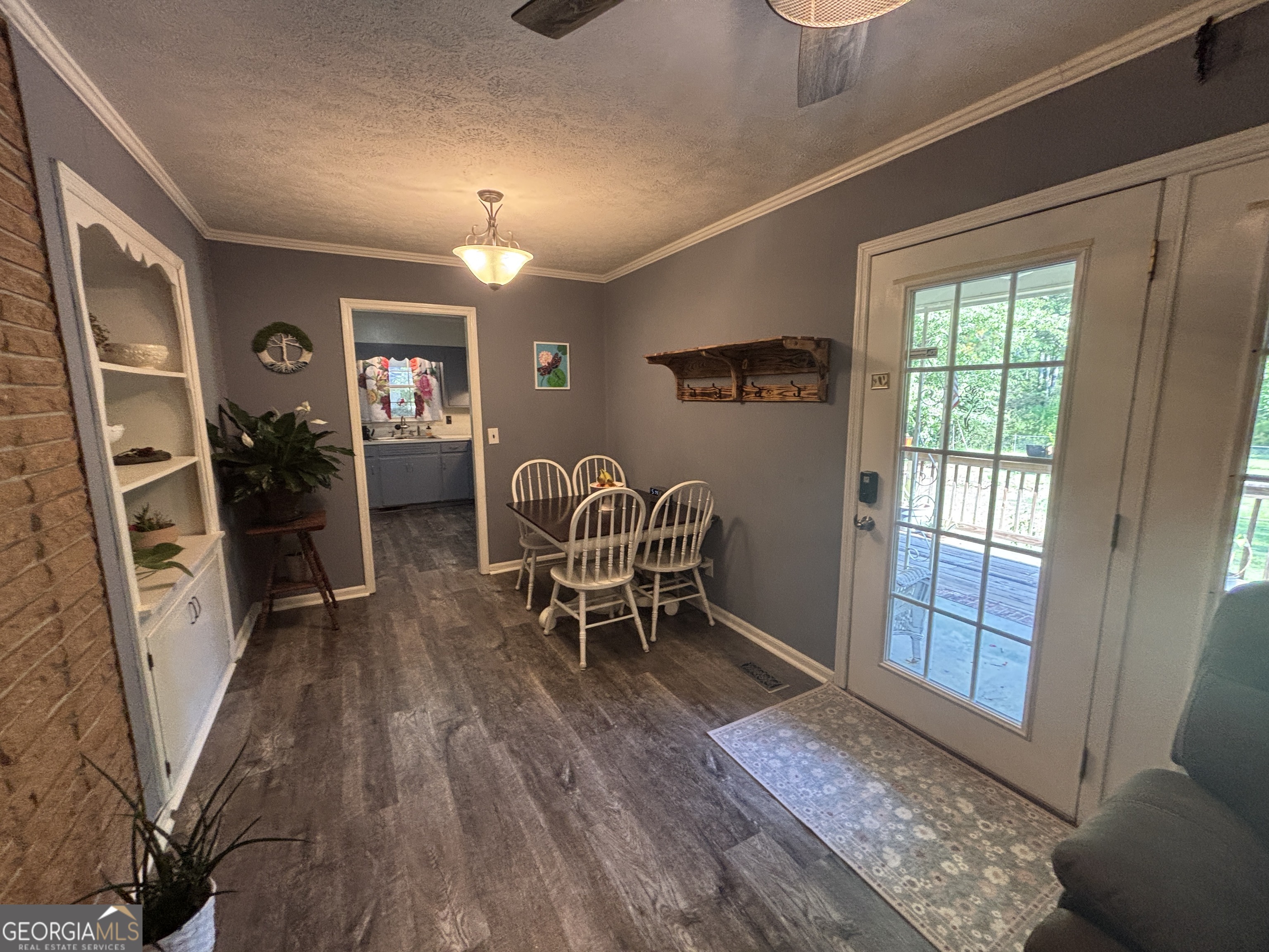 152 Crest Drive Cochran, GA 31014 - Photo 11 of 54 a workspace room with furniture and a window