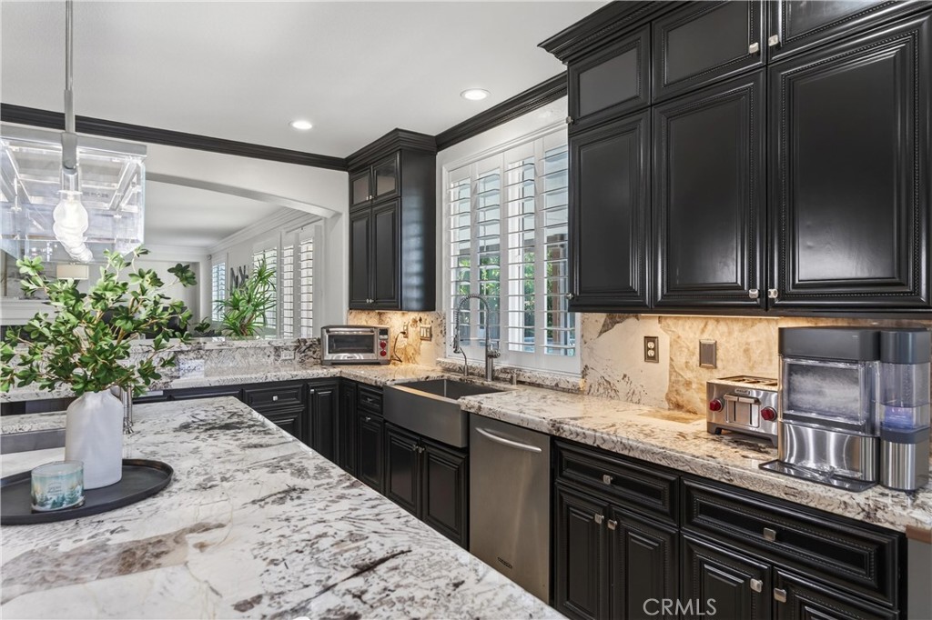 2634 Old Windmill Court Riverside, CA 92503 - Photo 17 of 44 a kitchen with sink and cabinets