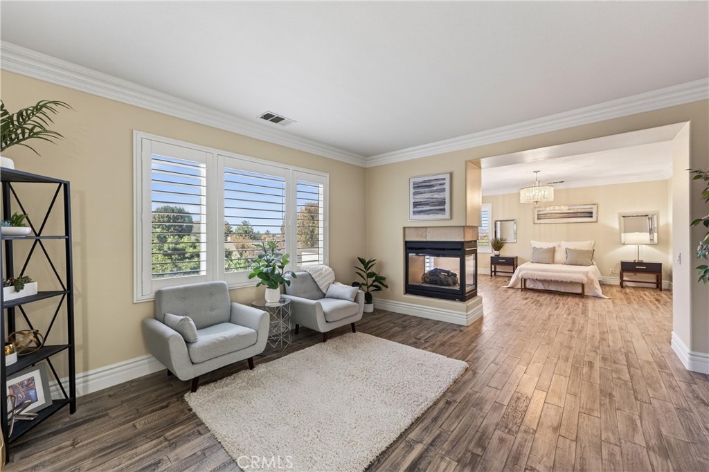 2634 Old Windmill Court Riverside, CA 92503 - Photo 25 of 44 a living room with furniture and a fireplace