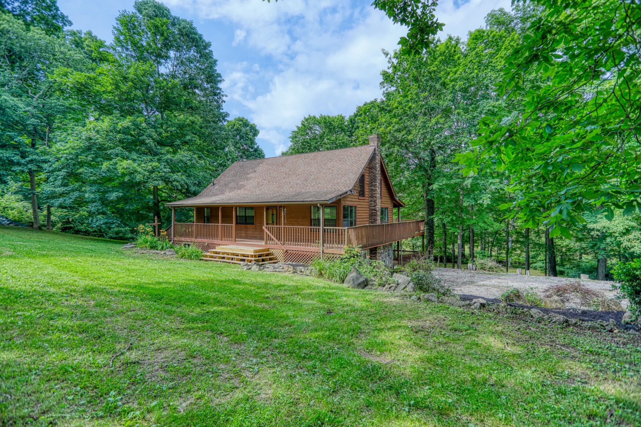 214 West Harper Road Portland, TN 37148 - Photo 1 of 28 a view of a house with a big yard