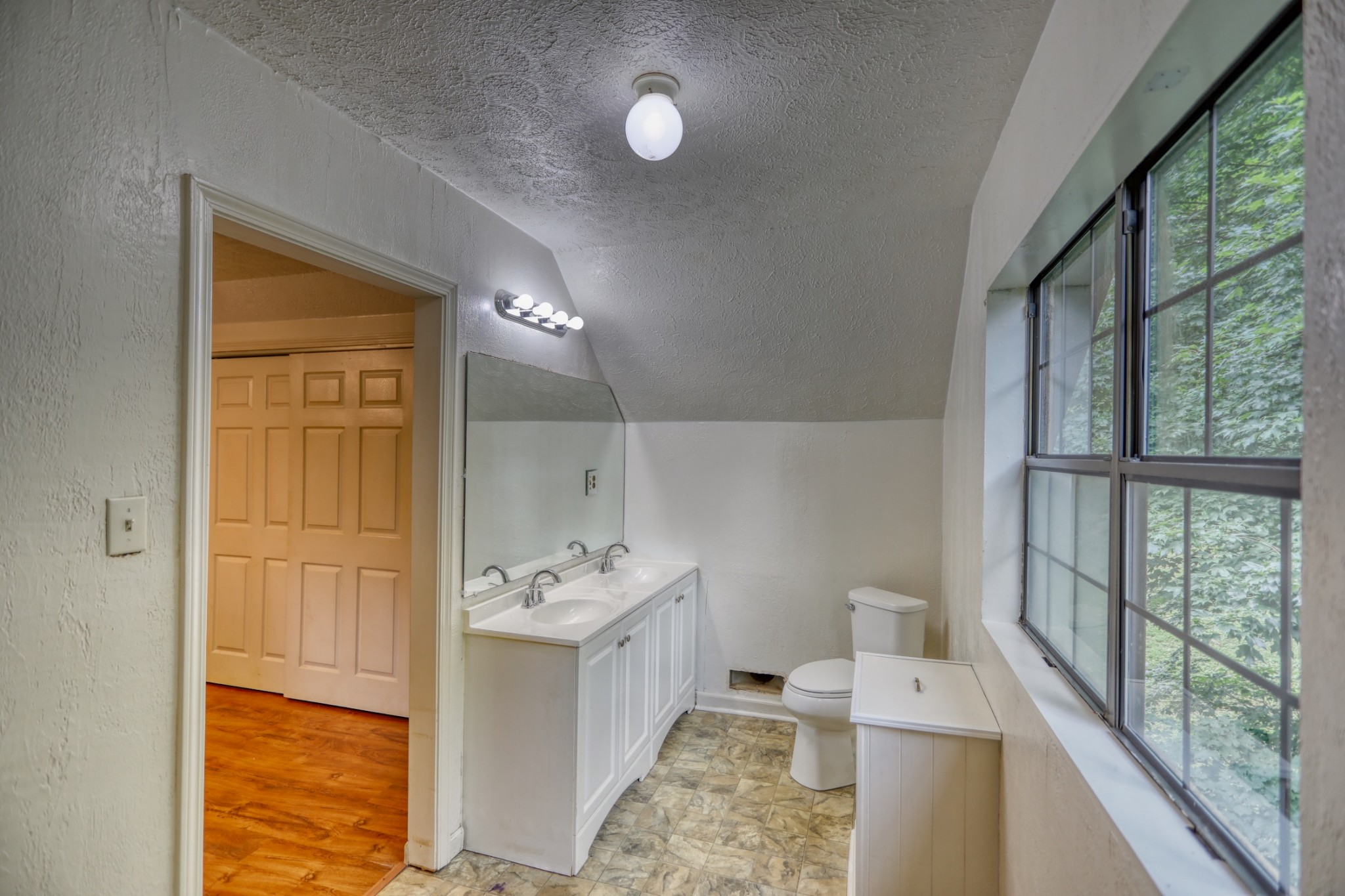 214 West Harper Road Portland, TN 37148 - Photo 12 of 28 a bathroom with a sink a toilet and shower