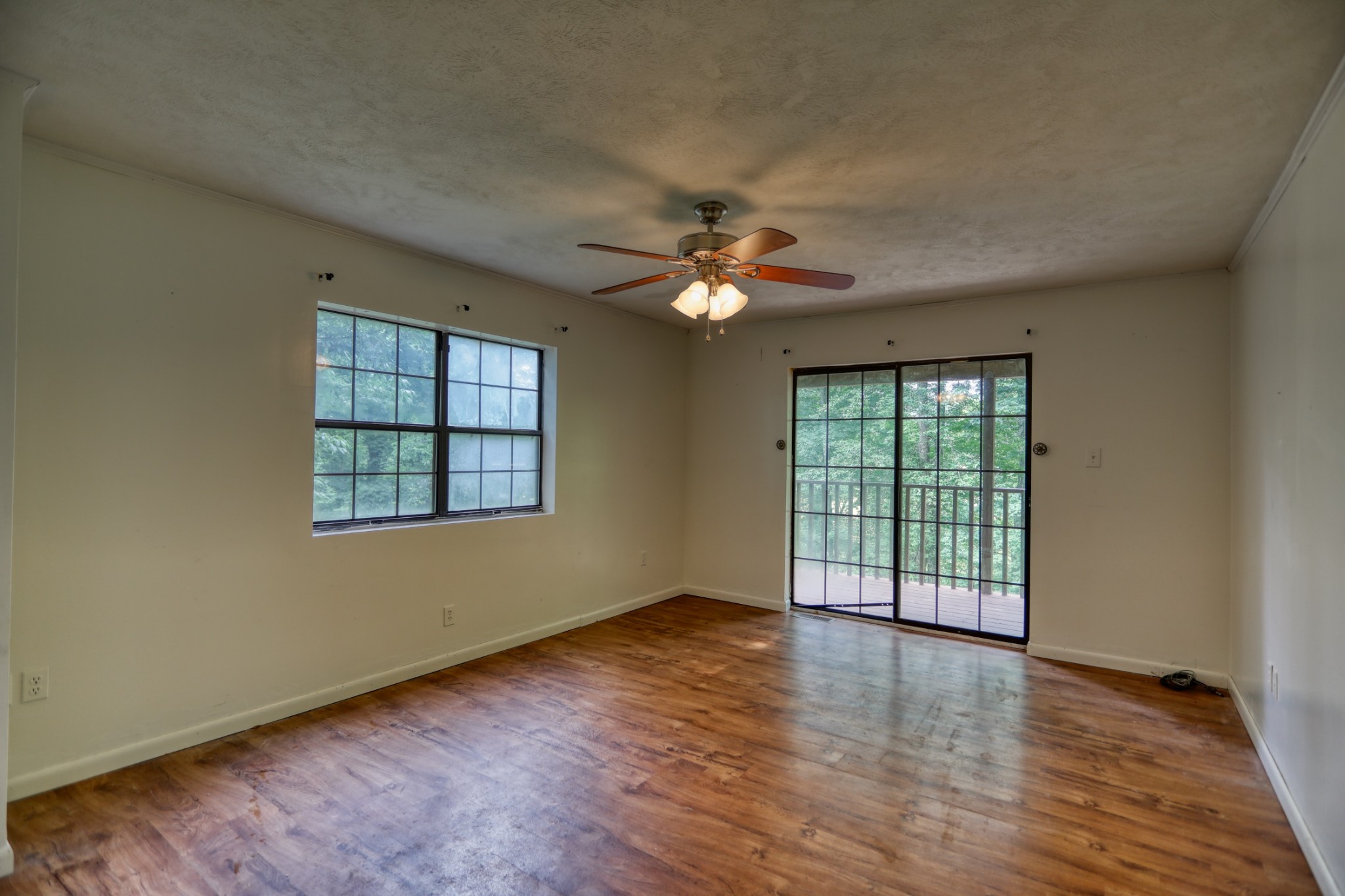 214 West Harper Road Portland, TN 37148 - Photo 13 of 28 wooden floor in an empty room with a window