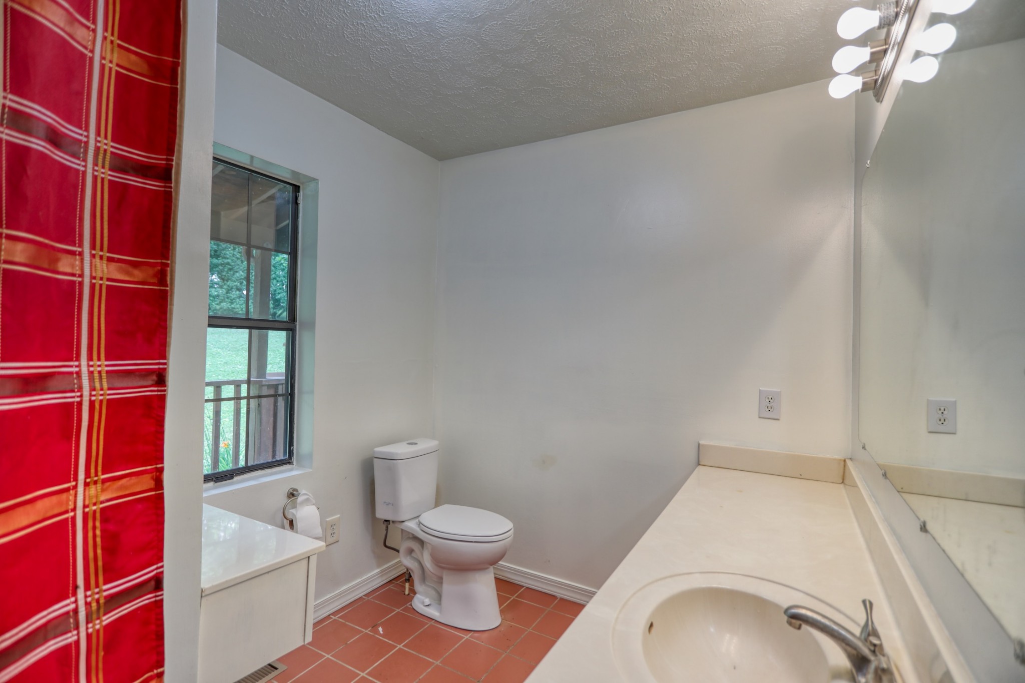 214 West Harper Road Portland, TN 37148 - Photo 16 of 28 a bathroom with a sink and toilet