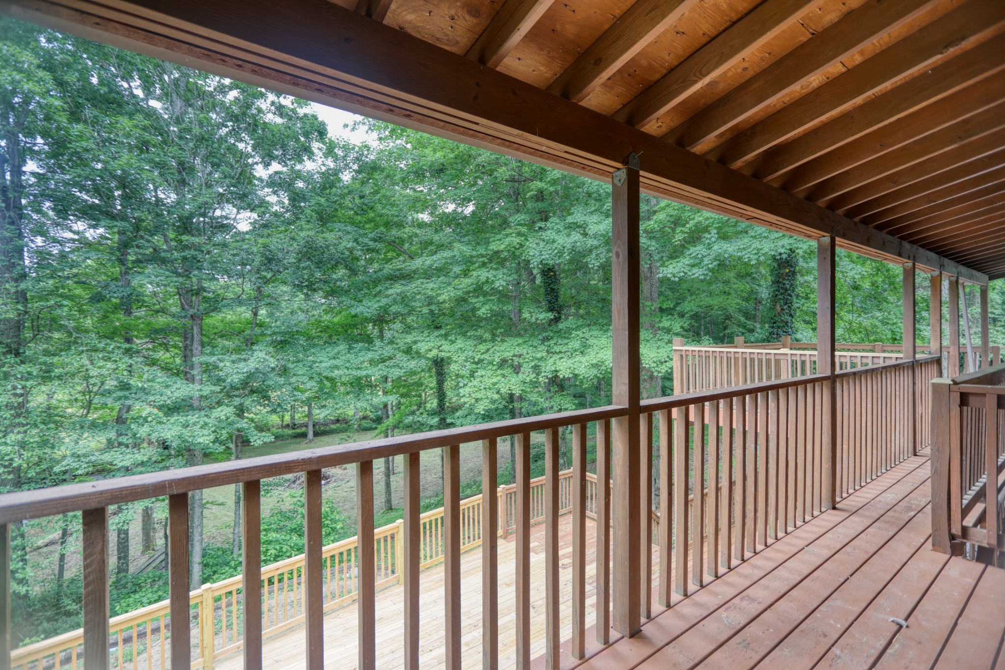 214 West Harper Road Portland, TN 37148 - Photo 17 of 28 a view of a balcony with wooden floor
