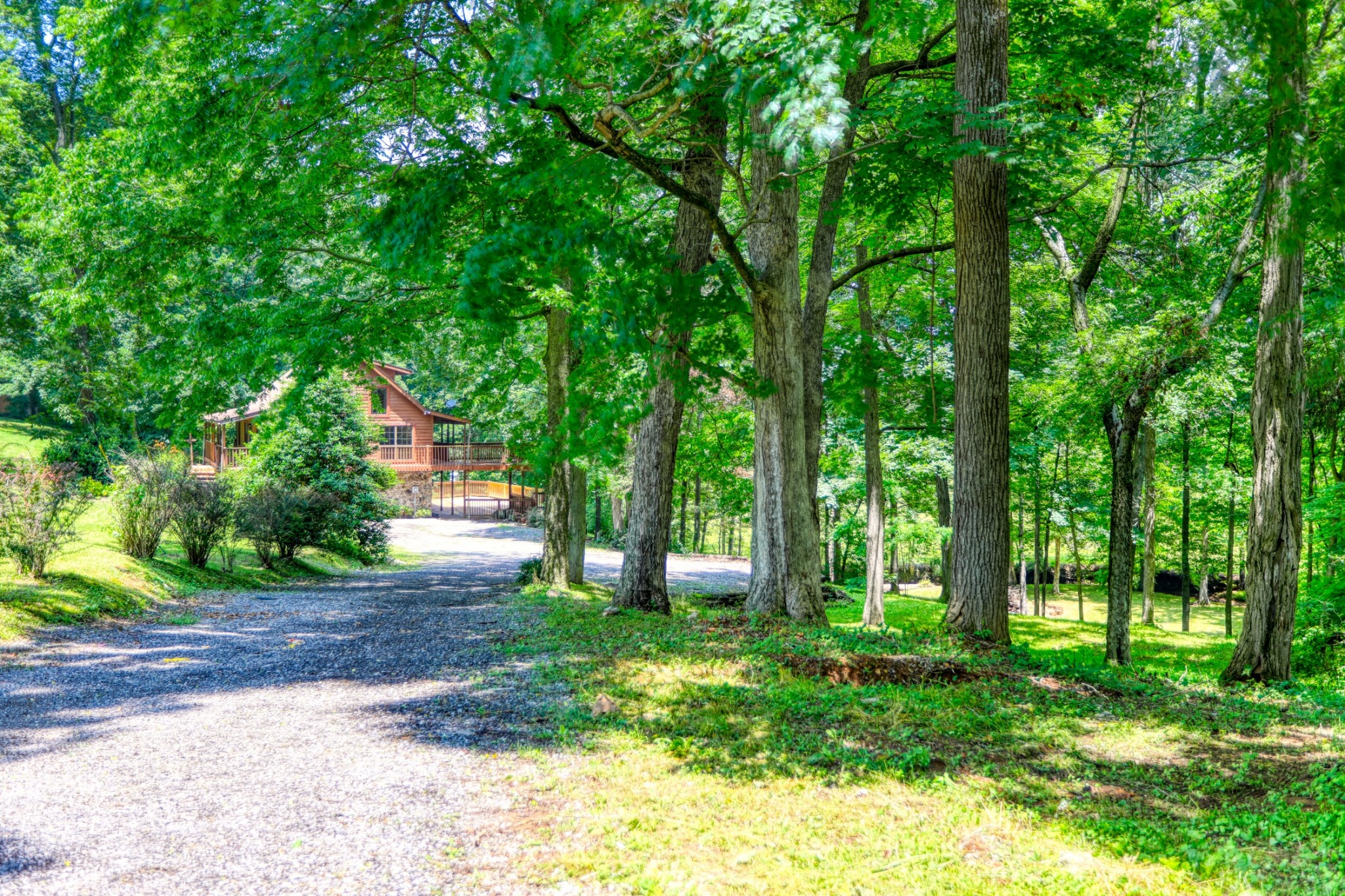 214 West Harper Road Portland, TN 37148 - Photo 20 of 28 a backyard of a house with lots of green space
