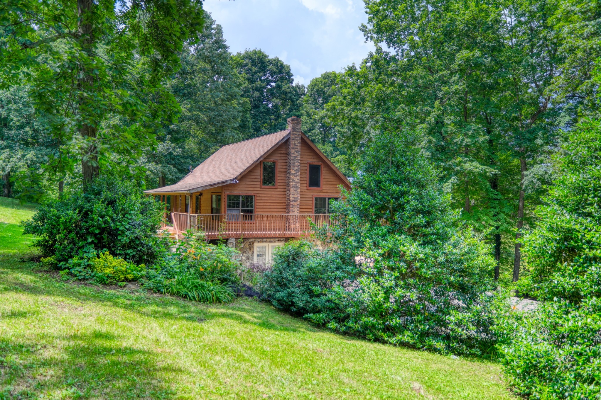 214 West Harper Road Portland, TN 37148 - Photo 21 of 28 a aerial view of a house next to a big yard and large trees