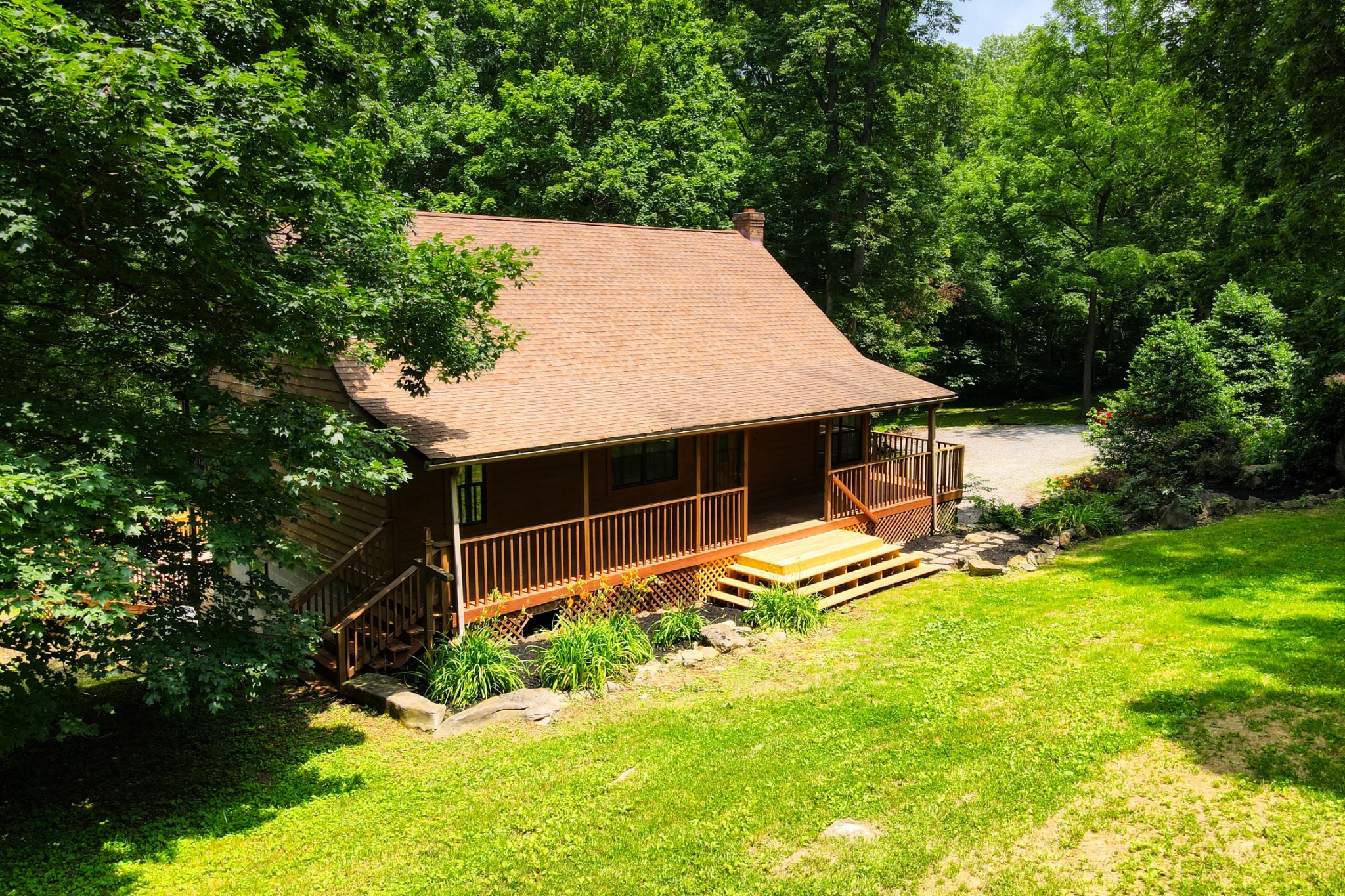 214 West Harper Road Portland, TN 37148 - Photo 22 of 28 a view of a backyard with sitting area