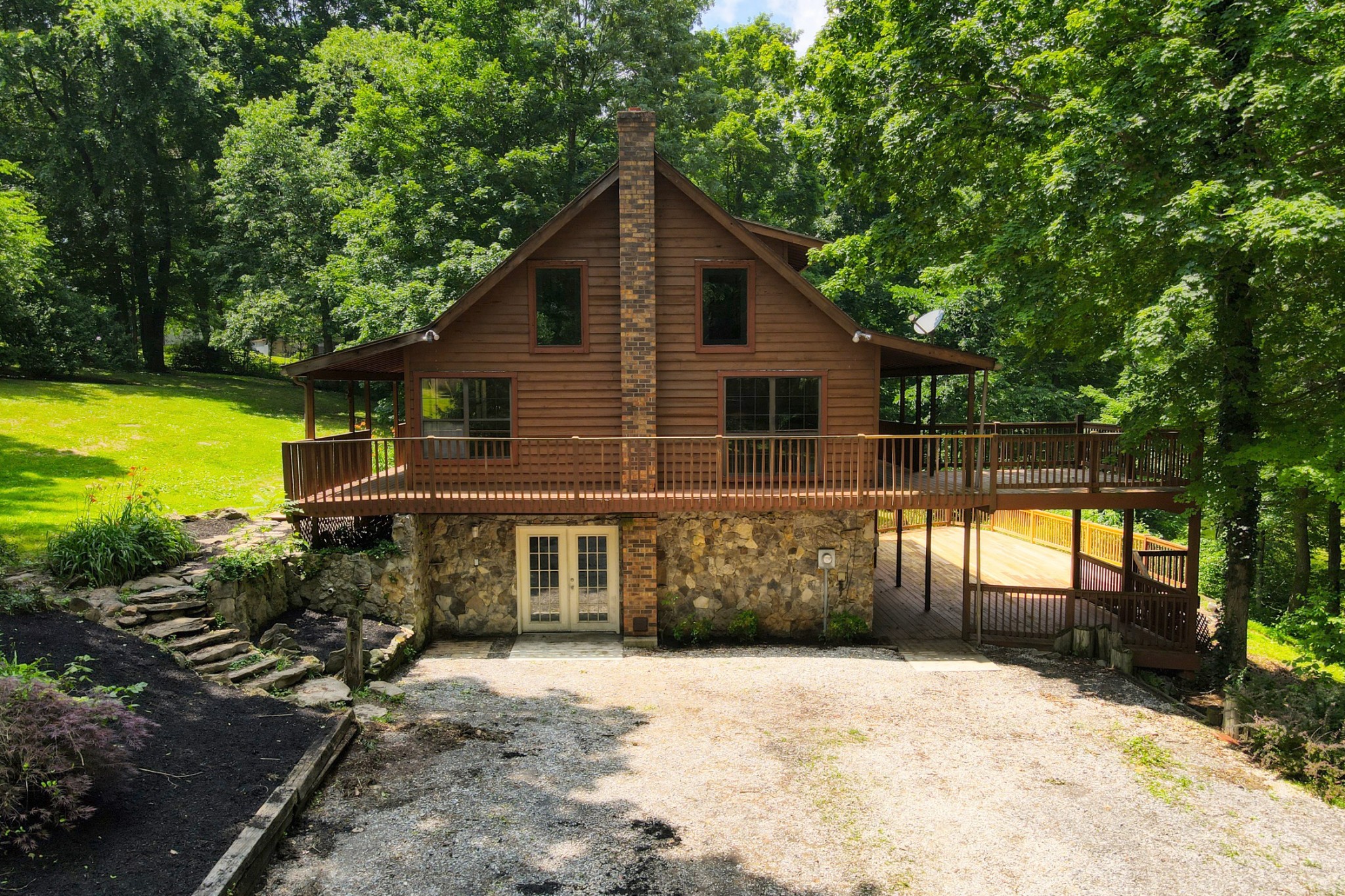 214 West Harper Road Portland, TN 37148 - Photo 24 of 28 a front view of a house with garden