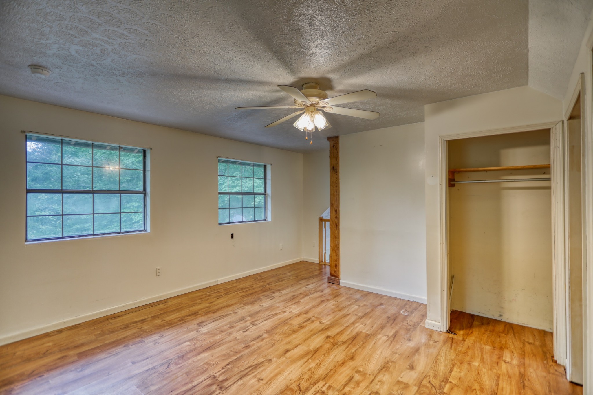 214 West Harper Road Portland, TN 37148 - Photo 10 of 28 wooden floor in an empty room with a window