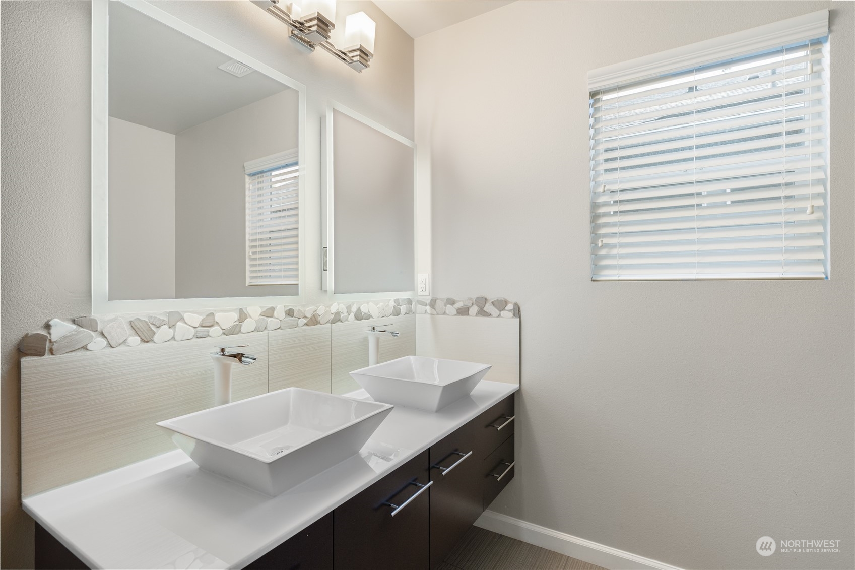 17914 46th Drive Southeast Bothell, WA 98012 - Photo 20 of 38 a bathroom with a sink and a mirror