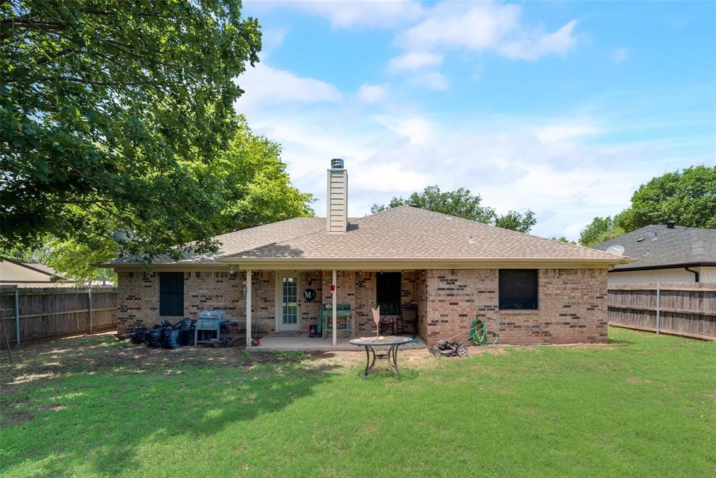 579 South Hitt Street Boyd, TX 76023 - Photo 31 of 34 Huge Back Yard with covered back patio