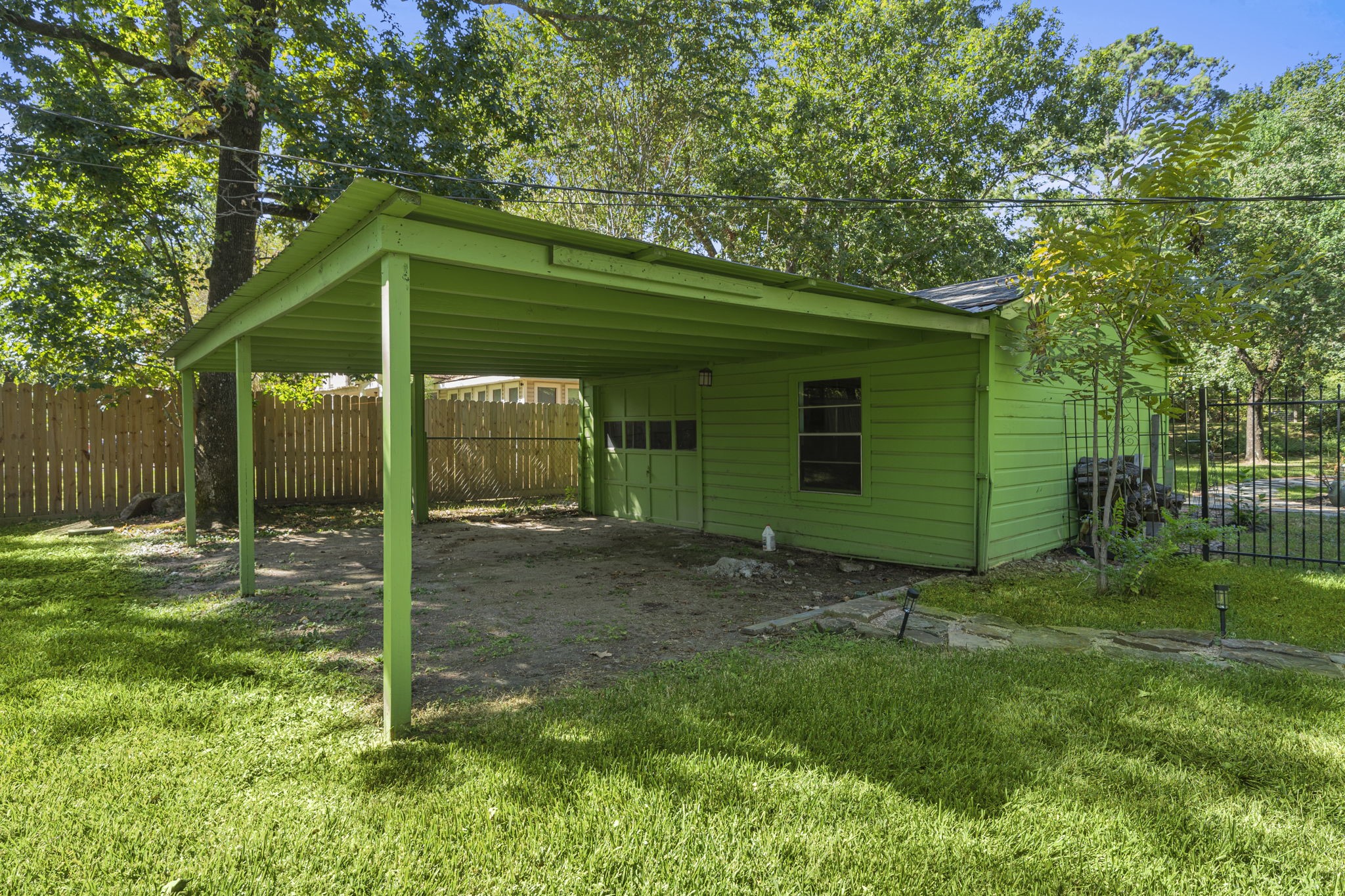 18162 Atkinson Lane Conroe, TX 77384 - Photo 12 of 50 a view of a backyard