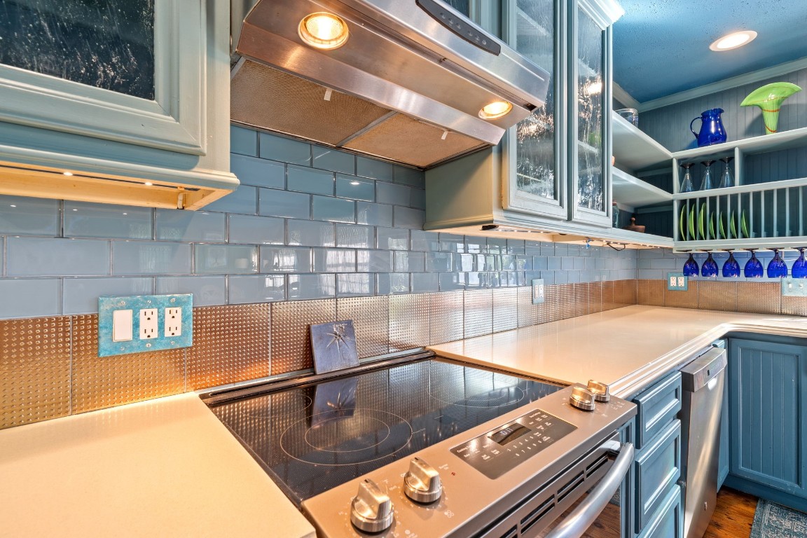 18162 Atkinson Lane Conroe, TX 77384 - Photo 14 of 50 All custom wood and glass cabinetry