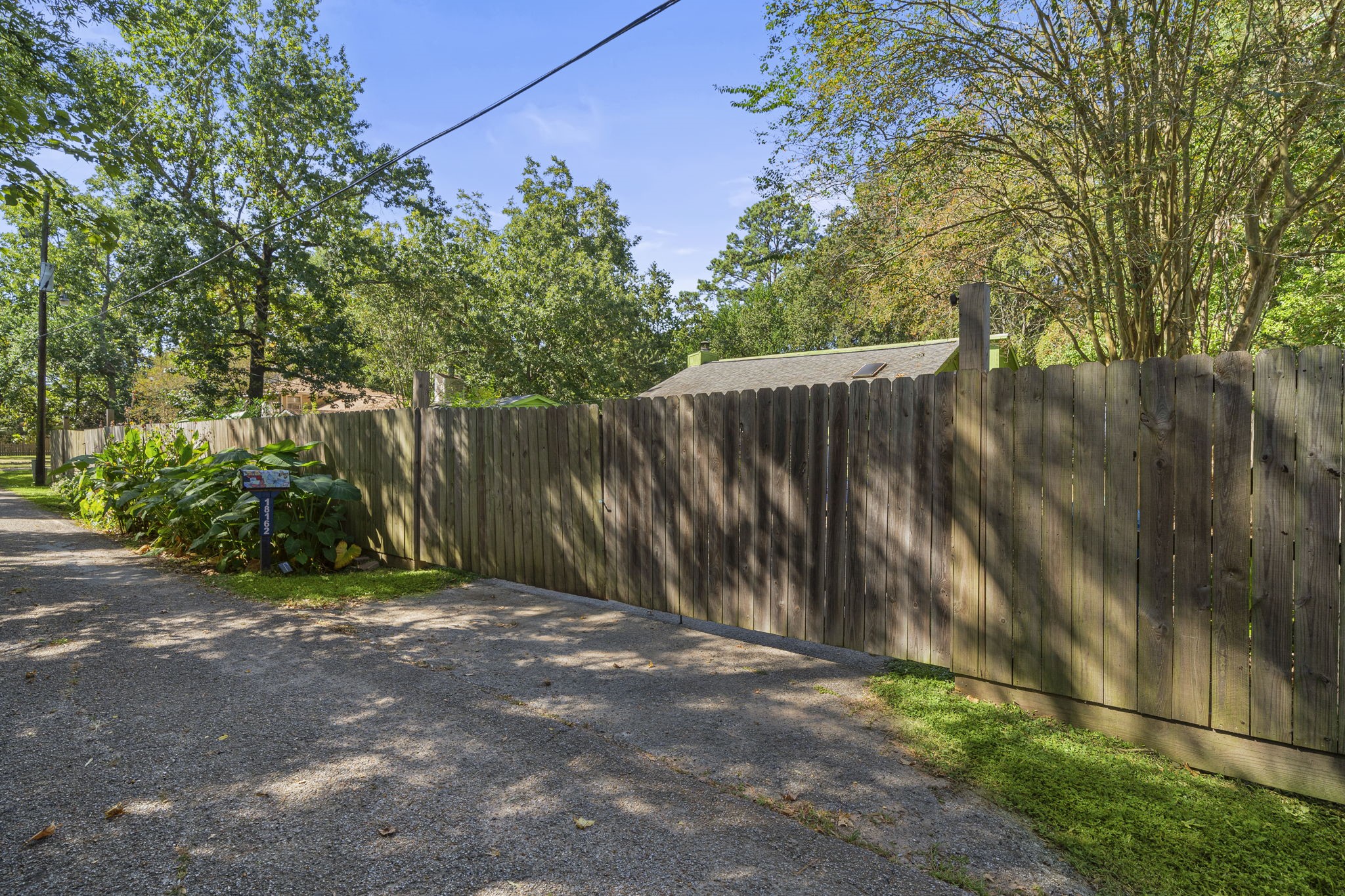 18162 Atkinson Lane Conroe, TX 77384 - Photo 14 of 50 a view of outdoor space with wooden fence