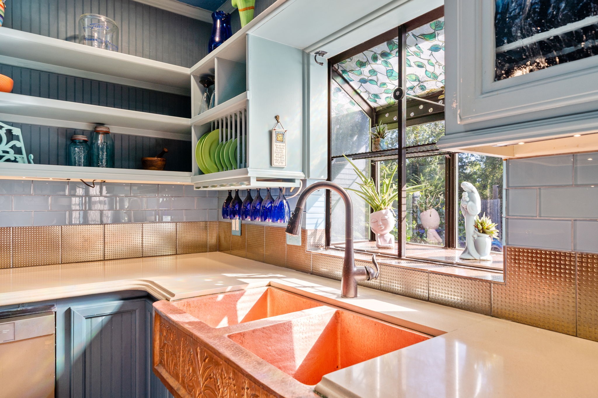 18162 Atkinson Lane Conroe, TX 77384 - Photo 15 of 50 a view of a kitchen with a large window and a sink