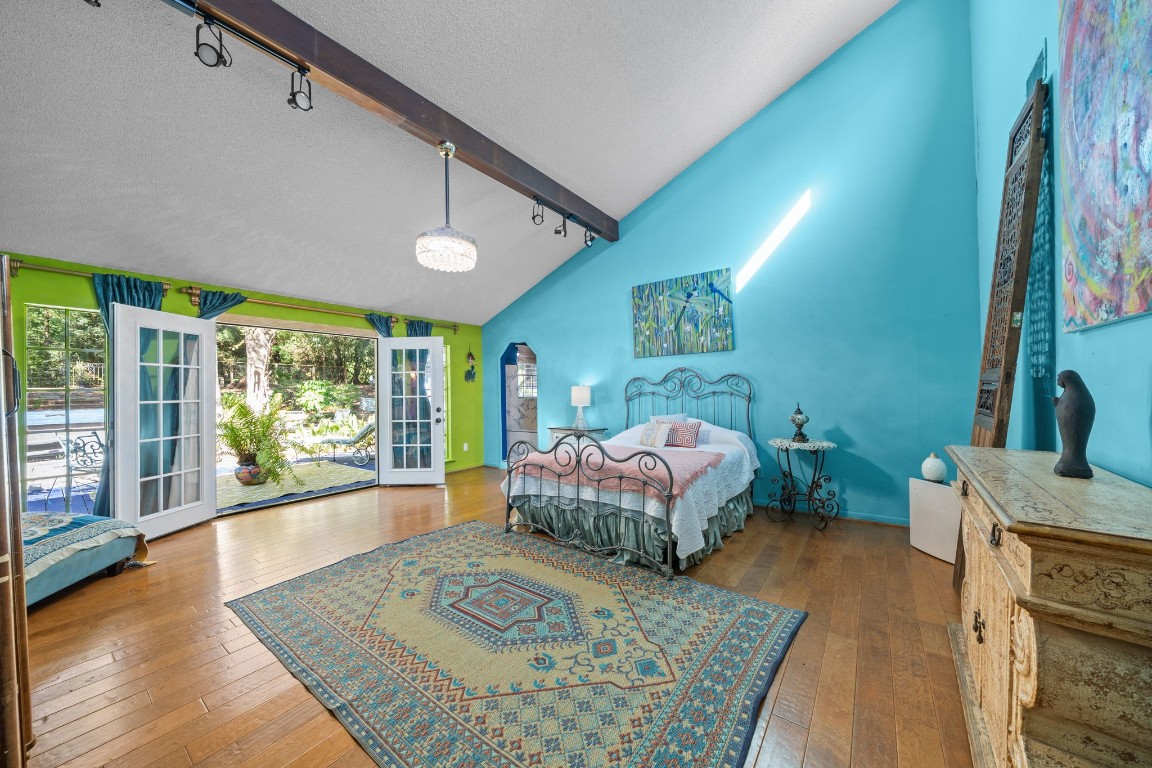 18162 Atkinson Lane Conroe, TX 77384 - Photo 22 of 50 Primary BR with brand new custom double doors; ceiling height over 20 feet