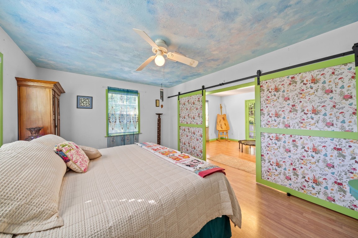 18162 Atkinson Lane Conroe, TX 77384 - Photo 26 of 50 2nd of three BR's with barn door access to craft room