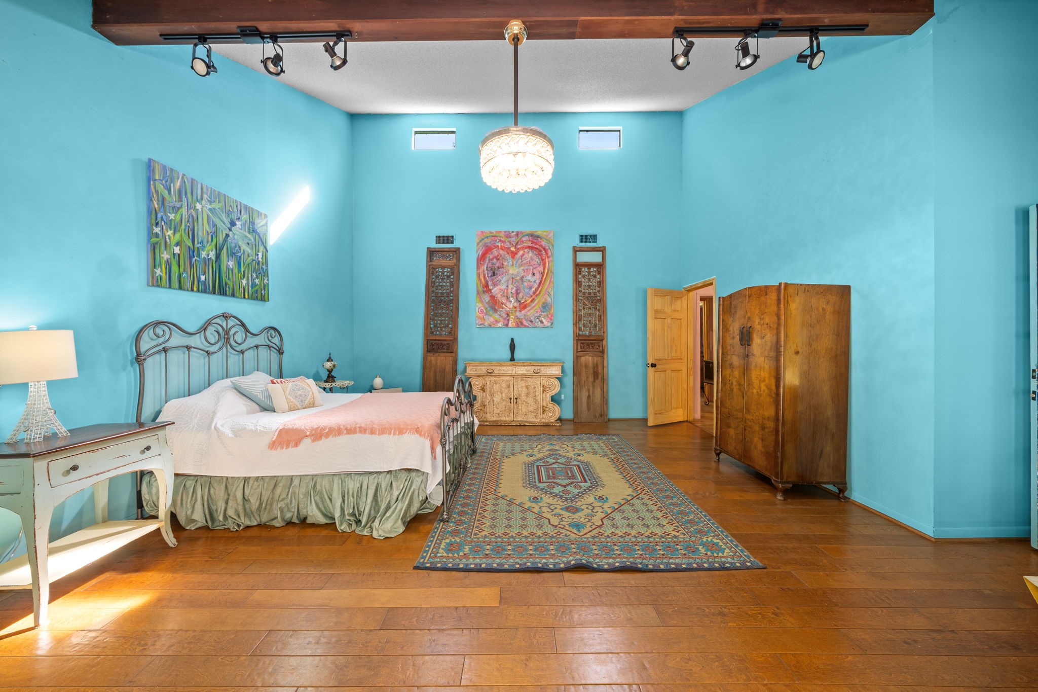 18162 Atkinson Lane Conroe, TX 77384 - Photo 27 of 50 a bedroom with a bed and a walk in closet