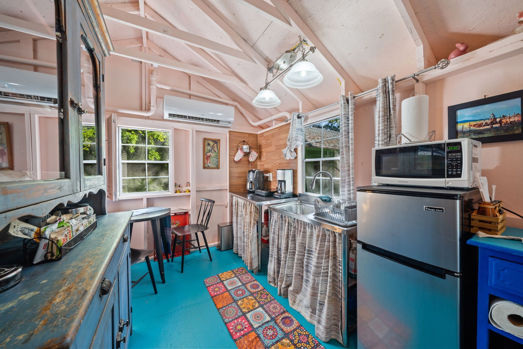 18162 Atkinson Lane Conroe, TX 77384 - Photo 40 of 50 a view of a dining room with furniture window and wooden floor