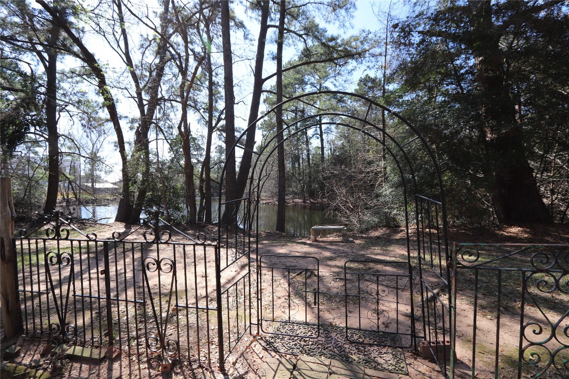 18162 Atkinson Lane Conroe, TX 77384 - Photo 45 of 50 Tranquil backyard with lake