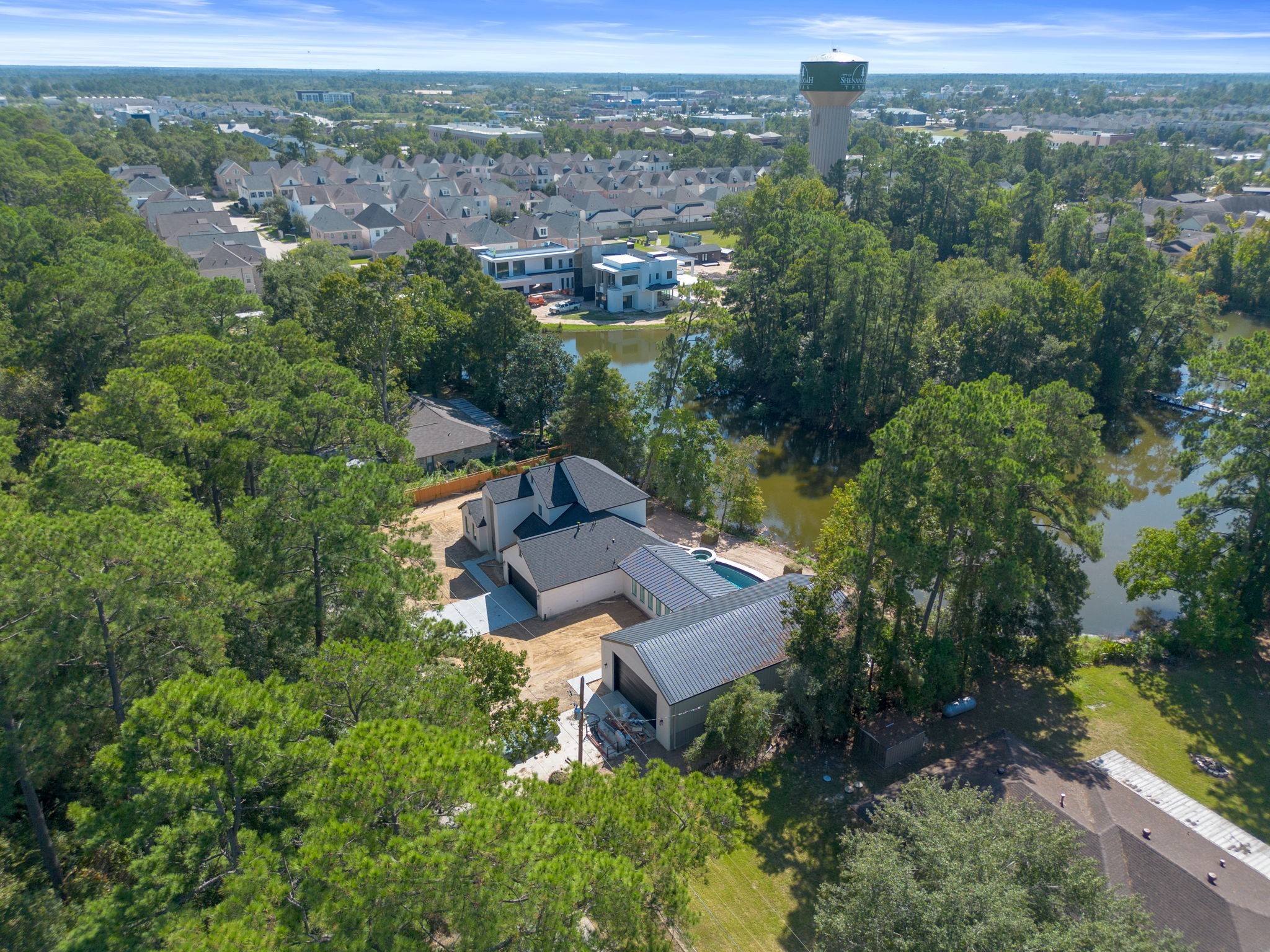 18162 Atkinson Lane Conroe, TX 77384 - Photo 46 of 50 an aerial view of a house with a yard