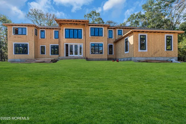 a view of a yard in front of a house