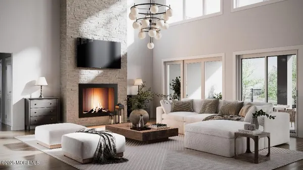 a living room with furniture fireplace and flat screen tv