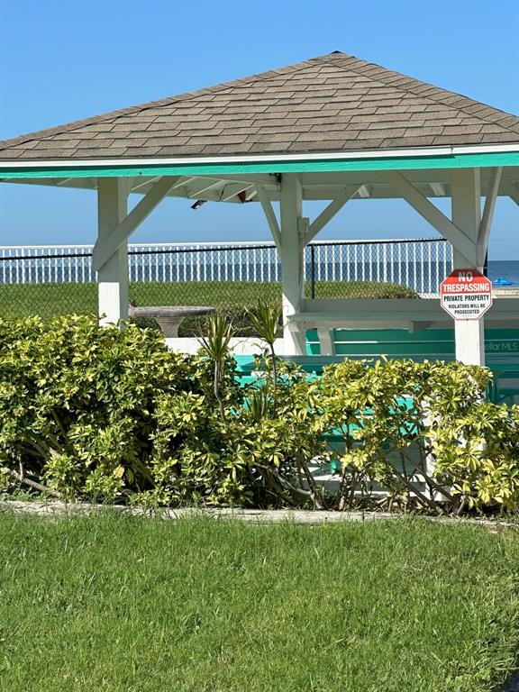 0 Gulf Boulevard Redington Shores, FL 33708 - Photo 11 of 21 a front view of a house with a garden
