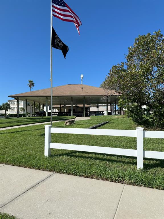 0 Gulf Boulevard Redington Shores, FL 33708 - Photo 20 of 21 a front view of a house with a yard