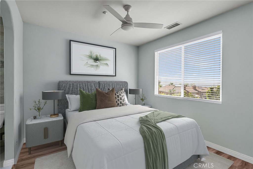 7535 Misty View Place Riverside, CA 92506 - Photo 34 of 75 a bedroom with a bed and a painting on the wall