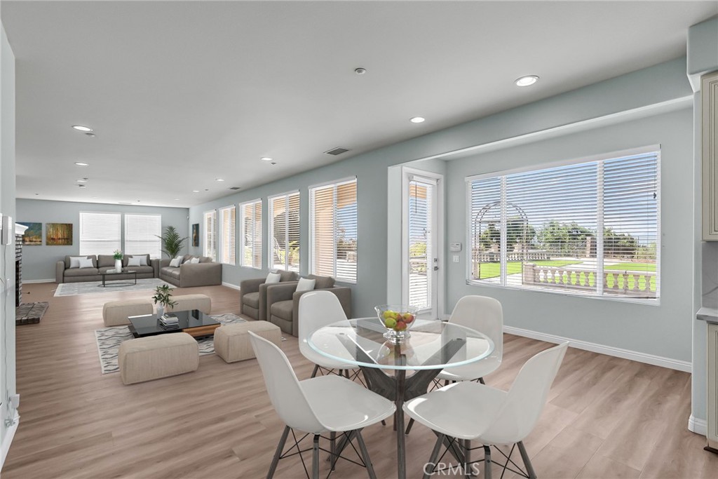 7535 Misty View Place Riverside, CA 92506 - Photo 39 of 75 a view of a dining room with furniture window and wooden floor