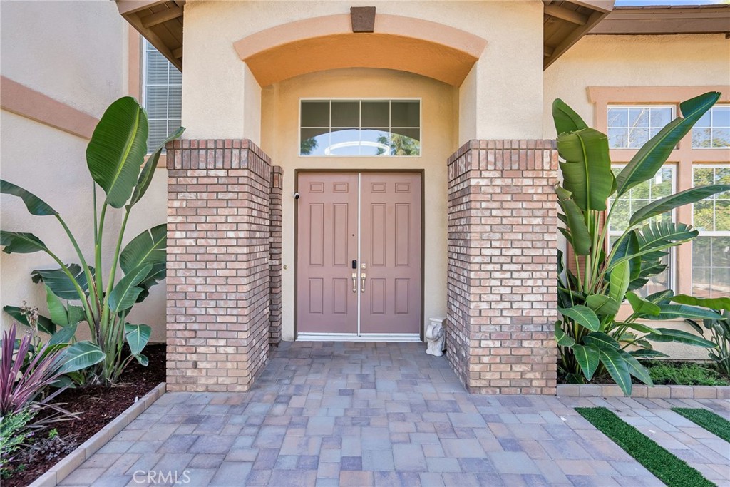 7535 Misty View Place Riverside, CA 92506 - Photo 58 of 75 a front view of a house with a yard
