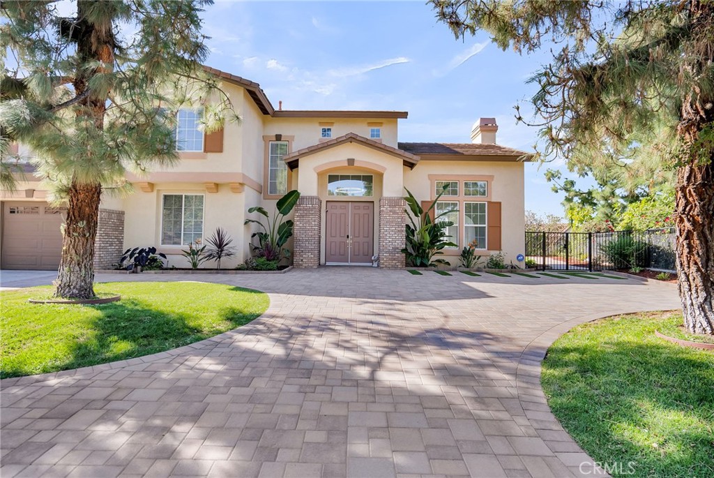 7535 Misty View Place Riverside, CA 92506 - Photo 61 of 75 a front view of a house with a yard and a porch