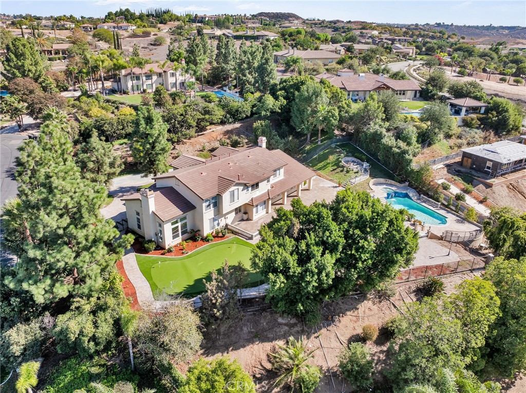 7535 Misty View Place Riverside, CA 92506 - Photo 65 of 75 an aerial view of a house with a garden