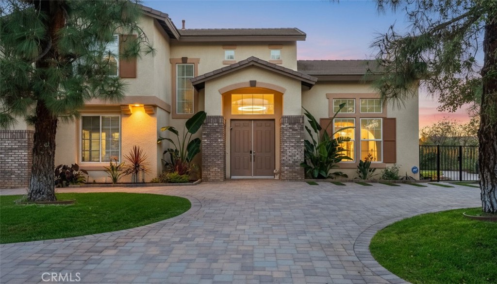 7535 Misty View Place Riverside, CA 92506 - Photo 69 of 75 a front view of a house with a yard