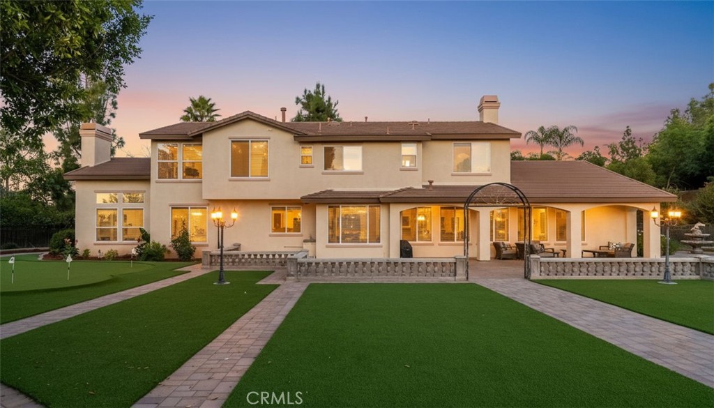 7535 Misty View Place Riverside, CA 92506 - Photo 9 of 75 a front view of a house with a yard