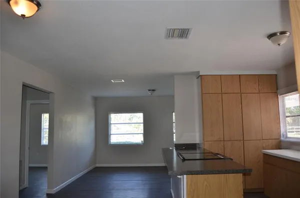 a view of kitchen with windows