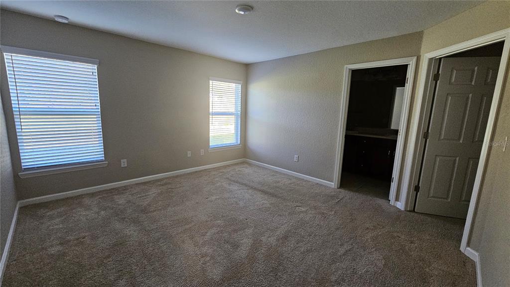 15944 Southwest 53rd Court Ocala, FL 34473 - Photo 13 of 22 a view of an empty room with a window