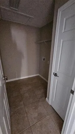 an empty room with a door