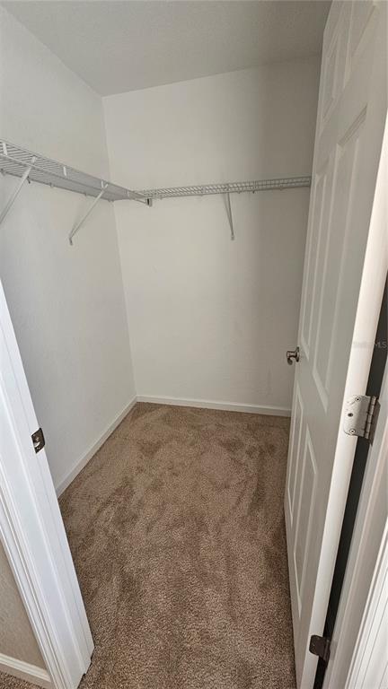 15944 Southwest 53rd Court Ocala, FL 34473 - Photo 21 of 22 a view of a room with racks on the wall