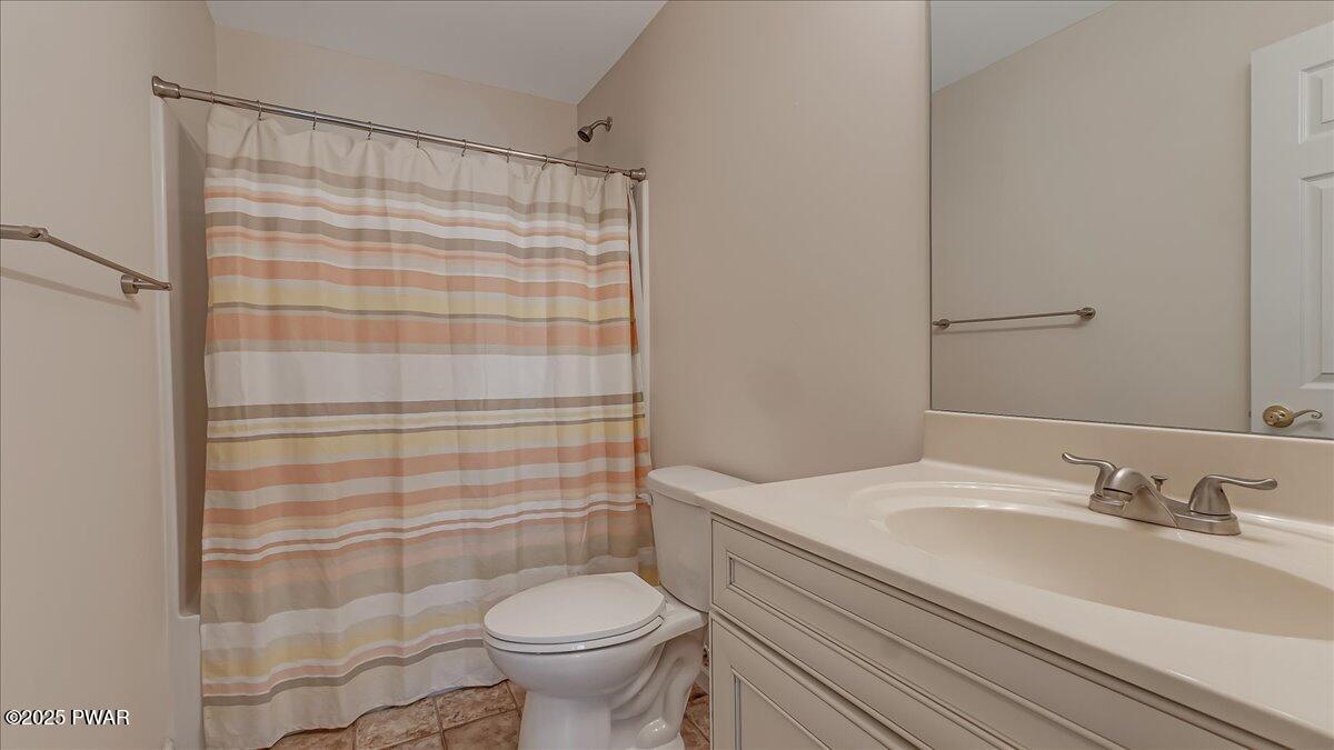 1010 MacIntosh Way Matamoras, PA 18336 - Photo 37 of 60 a bathroom with a sink toilet and shower
