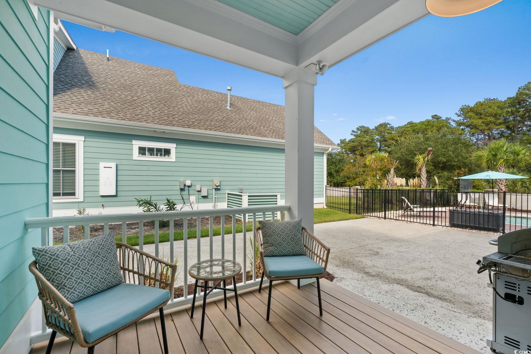 8336 Sandlapper Way Myrtle Beach, SC 29572 - Photo 27 of 40 Deck featuring a patio