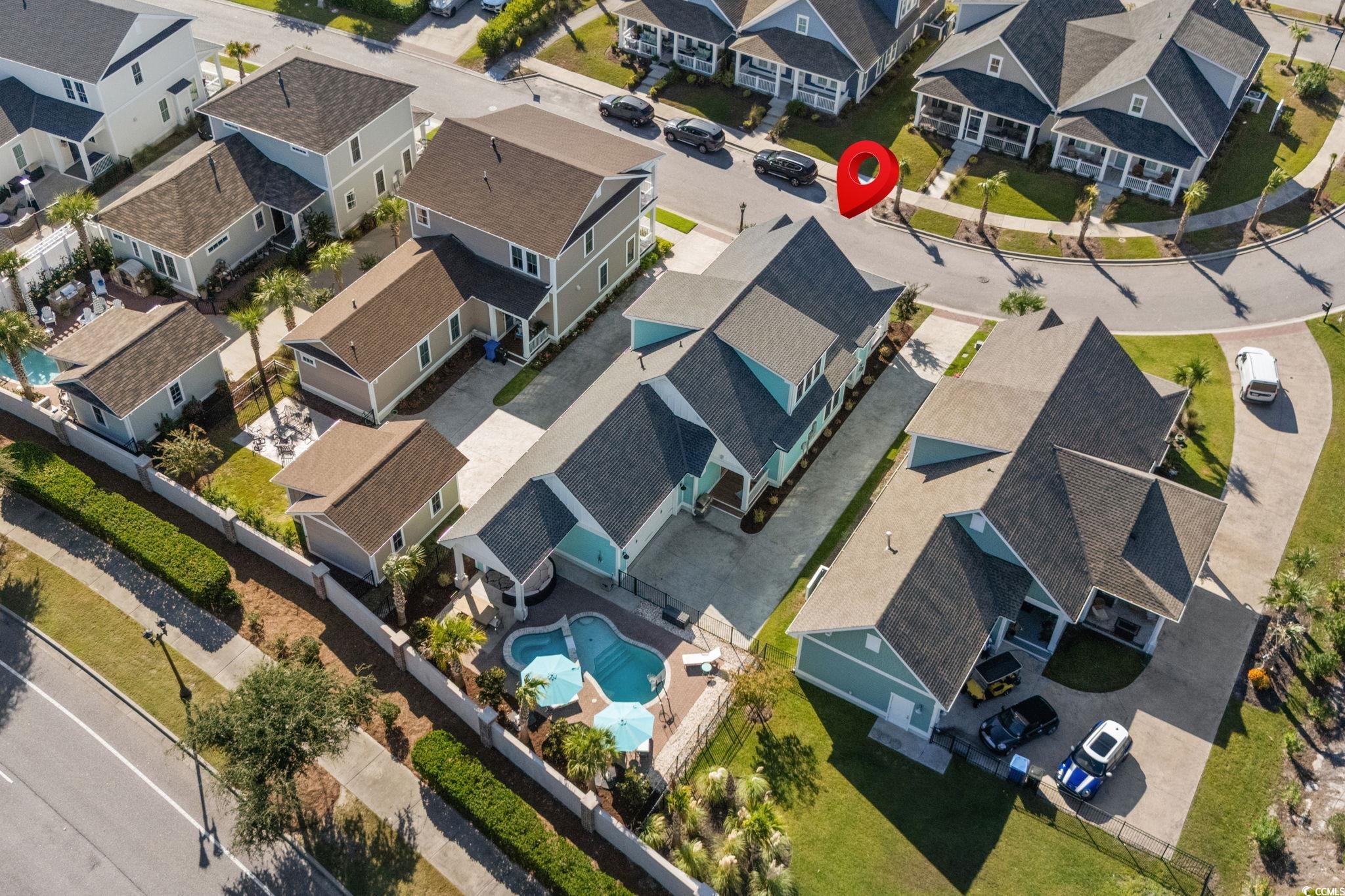 8336 Sandlapper Way Myrtle Beach, SC 29572 - Photo 3 of 40 Drone / aerial view of a pool