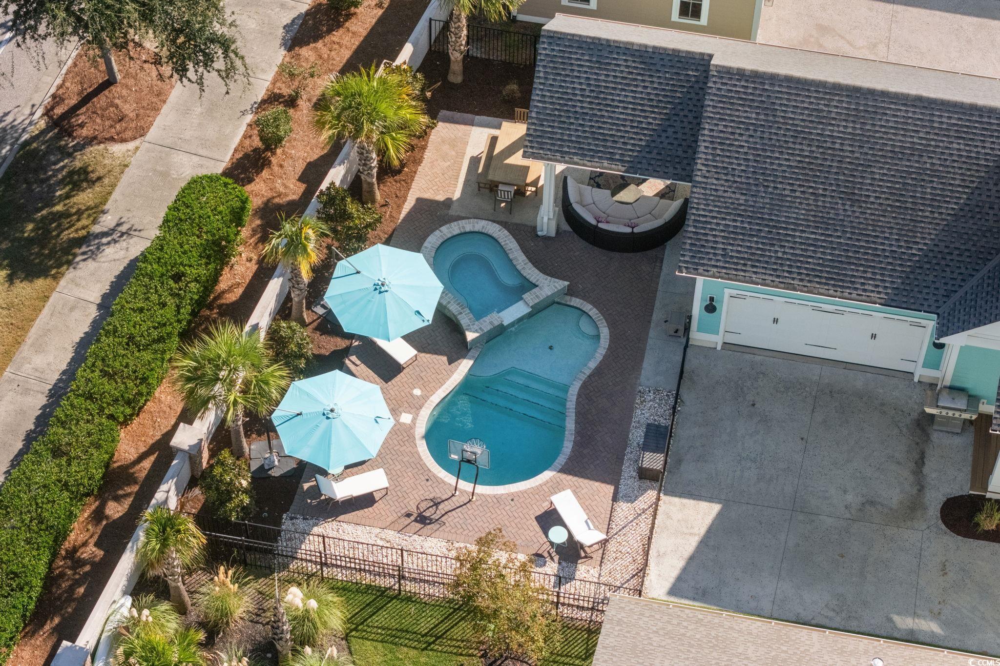8336 Sandlapper Way Myrtle Beach, SC 29572 - Photo 4 of 40 Bird's eye view of a pool area