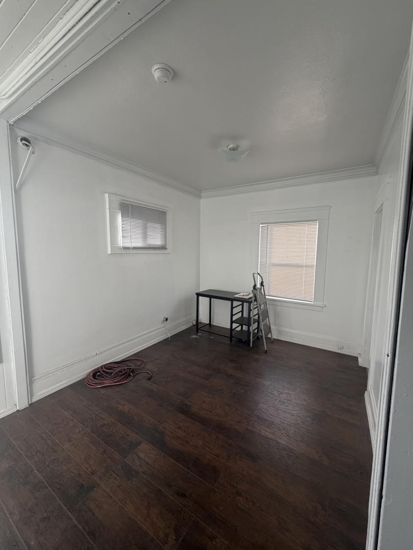 2340 Alisal Road, Unit A Salinas, CA 93908 - Photo 11 of 25 a view of wooden floor and windows in an empty room