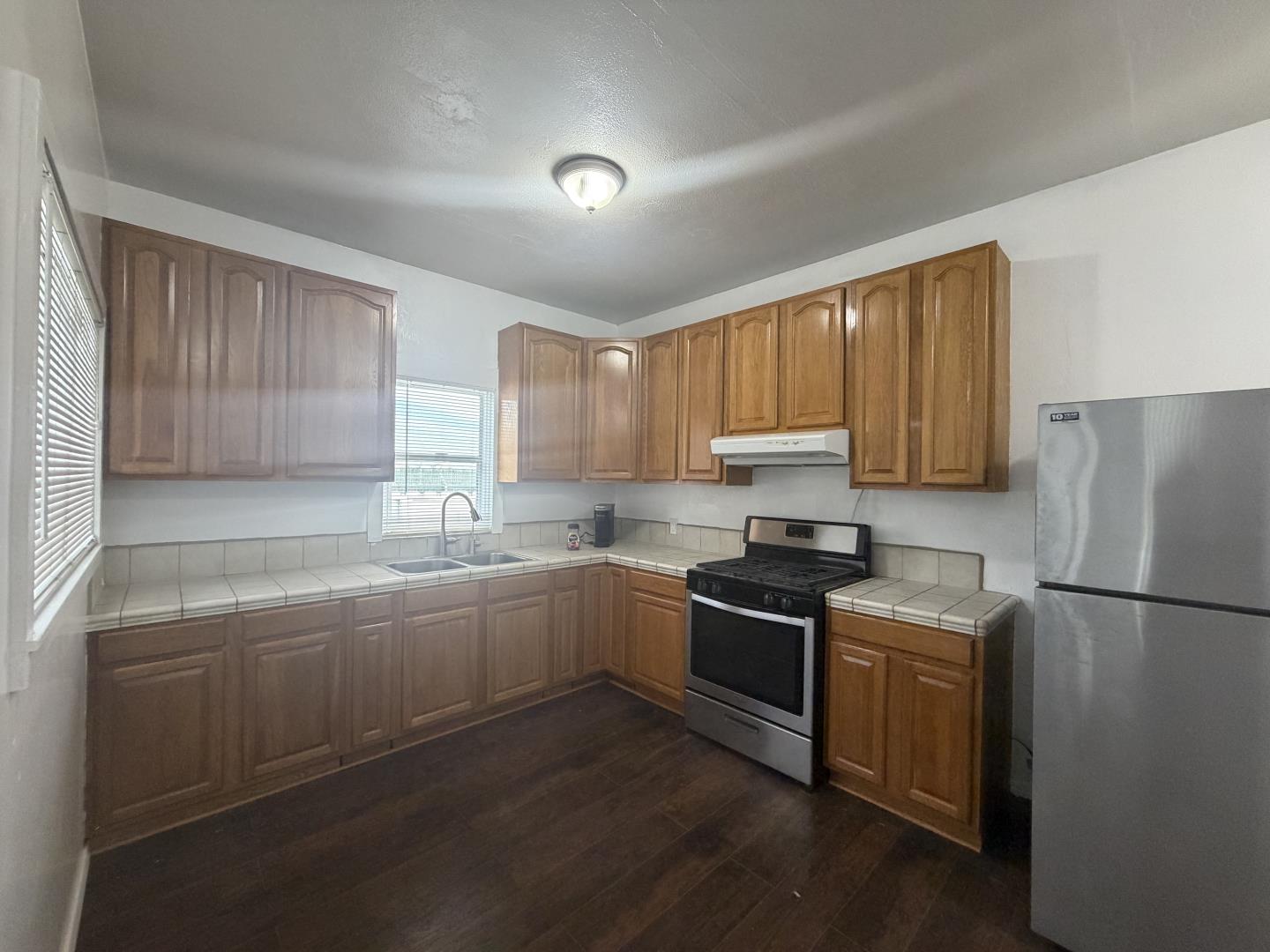 2340 Alisal Road, Unit A Salinas, CA 93908 - Photo 17 of 25 a kitchen with a sink stove and refrigerator