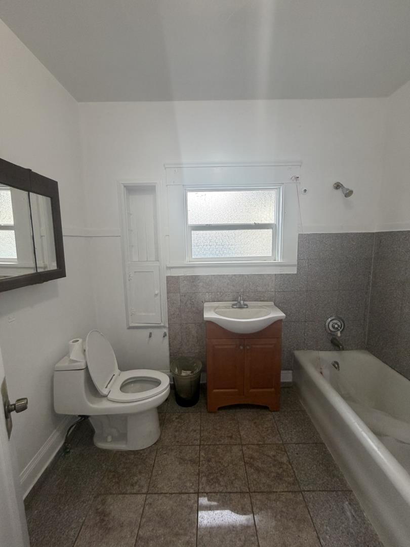 2340 Alisal Road, Unit A Salinas, CA 93908 - Photo 18 of 25 a bathroom with a sink a toilet and bathtub